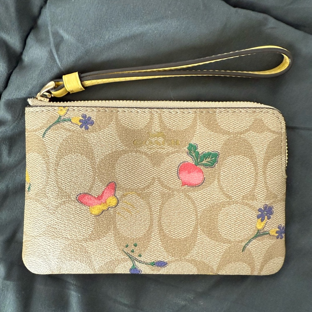 Coach Beige Wristlet with Colorful Floral and Butterfly Accents